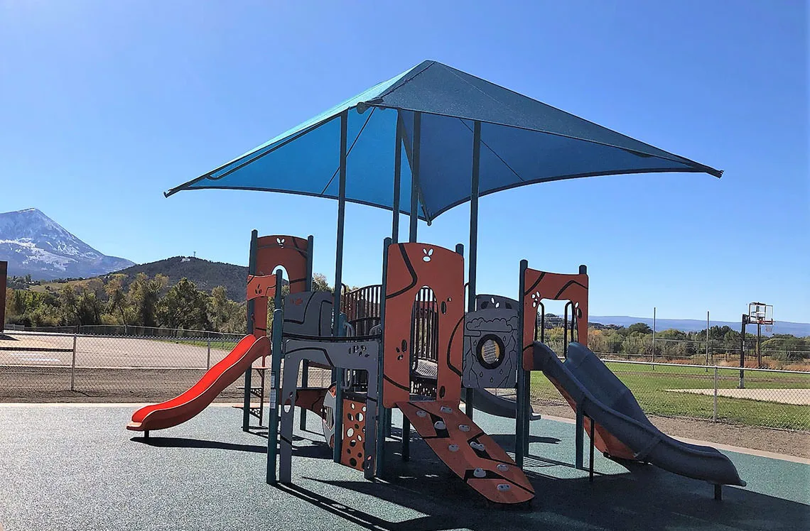 Small playground slides at Paonia Pre-K in Paonia, CO